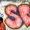 woman-and-graffiti-delhi