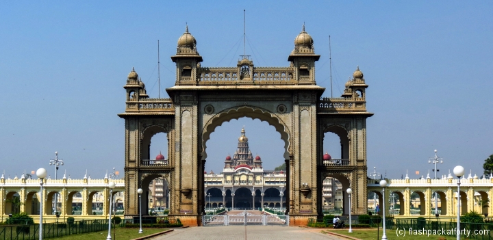 main-gate-with-mysore-palace-in-distance-india