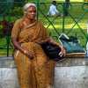 old-woman-waits-mysore-palace-india
