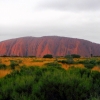 Uluru and green scrub