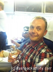 john-with-champers-business-class