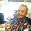 john-with-champers-business-class