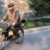 old-man-on-bike-forbidden-city-beijing