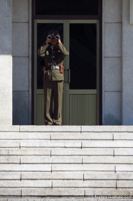 binoculars-north-korean-guard