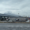 legapazi-bus-and-jeepney-terminal-with-volcano-under-clouds