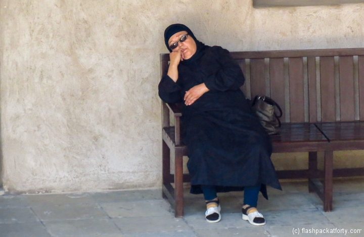 woman-snoozes-in-old-dubai