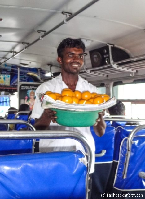 galle-bus-seller-with-oranges