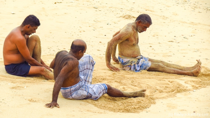 sand-washing-galle-fort-beach