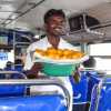 galle-bus-seller-with-oranges