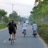 monks cycling hoi an