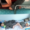 Vietnemese children asleep on train