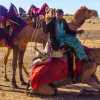 camel-driver-lowers-camels-jaisalmer