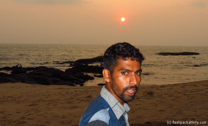 man-at-sunset-ezhara-beach