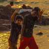 indian-kids-waving-at-kannur-beach