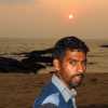 man-at-sunset-ezhara-beach