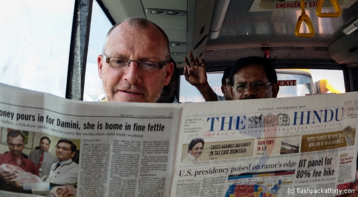 flashpacker-reading-indian-newspaper