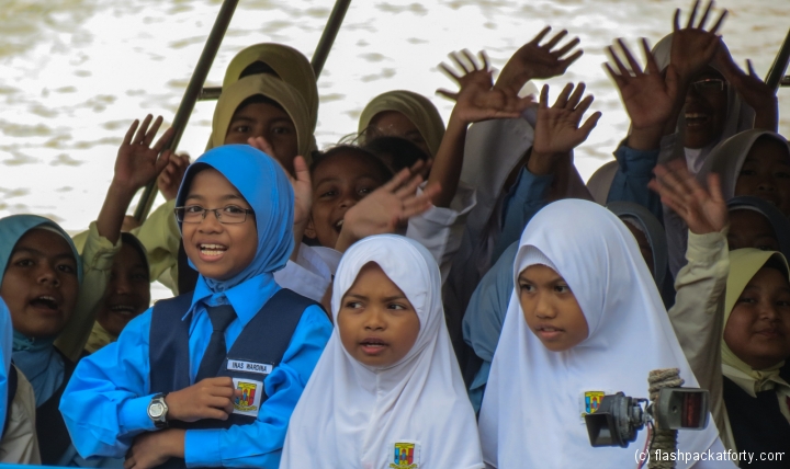 kids-waving-melacca