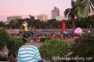 boy-watches-light-show-rizal-park-manila