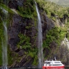 milford-sound-boat-waterfall