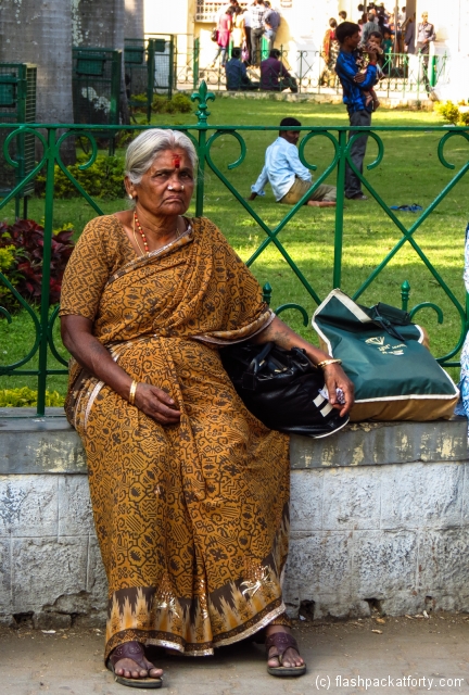 old-woman-waits-mysore-palace-india