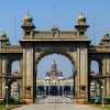 main-gate-with-mysore-palace-in-distance-india