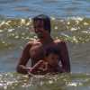 man-and-baby-in-sea-negombo
