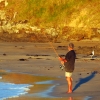 otamure-beach-fisherman-seagull-standoff