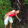 john-fills-water-from-mountain-stream-pagudpud