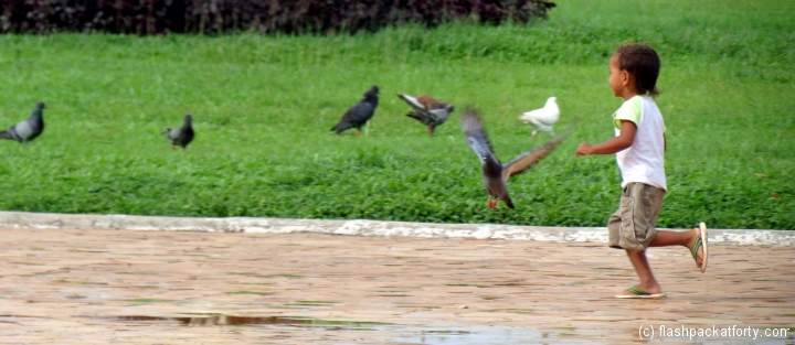boy-with-pigeons-phnom-penh