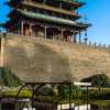 north-gate-pingyao-wall-with-electric-taxi