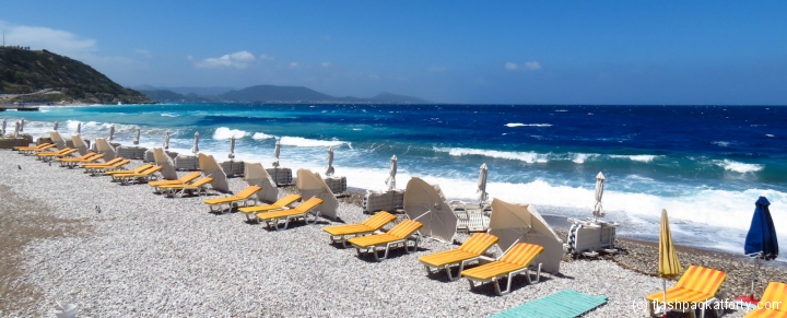 yellow-sunbeds-at-rhodes-beach
