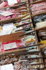 chopsticks-and-food-samples-in-japanese-market