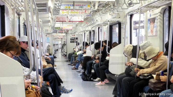 Commuters sleeping Tokyo Japan