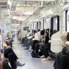 Commuters sleeping Tokyo Japan