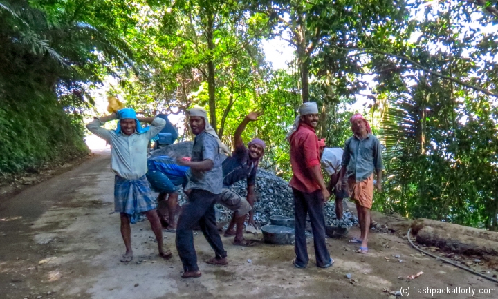 workmen-pose-wayanad-road-works